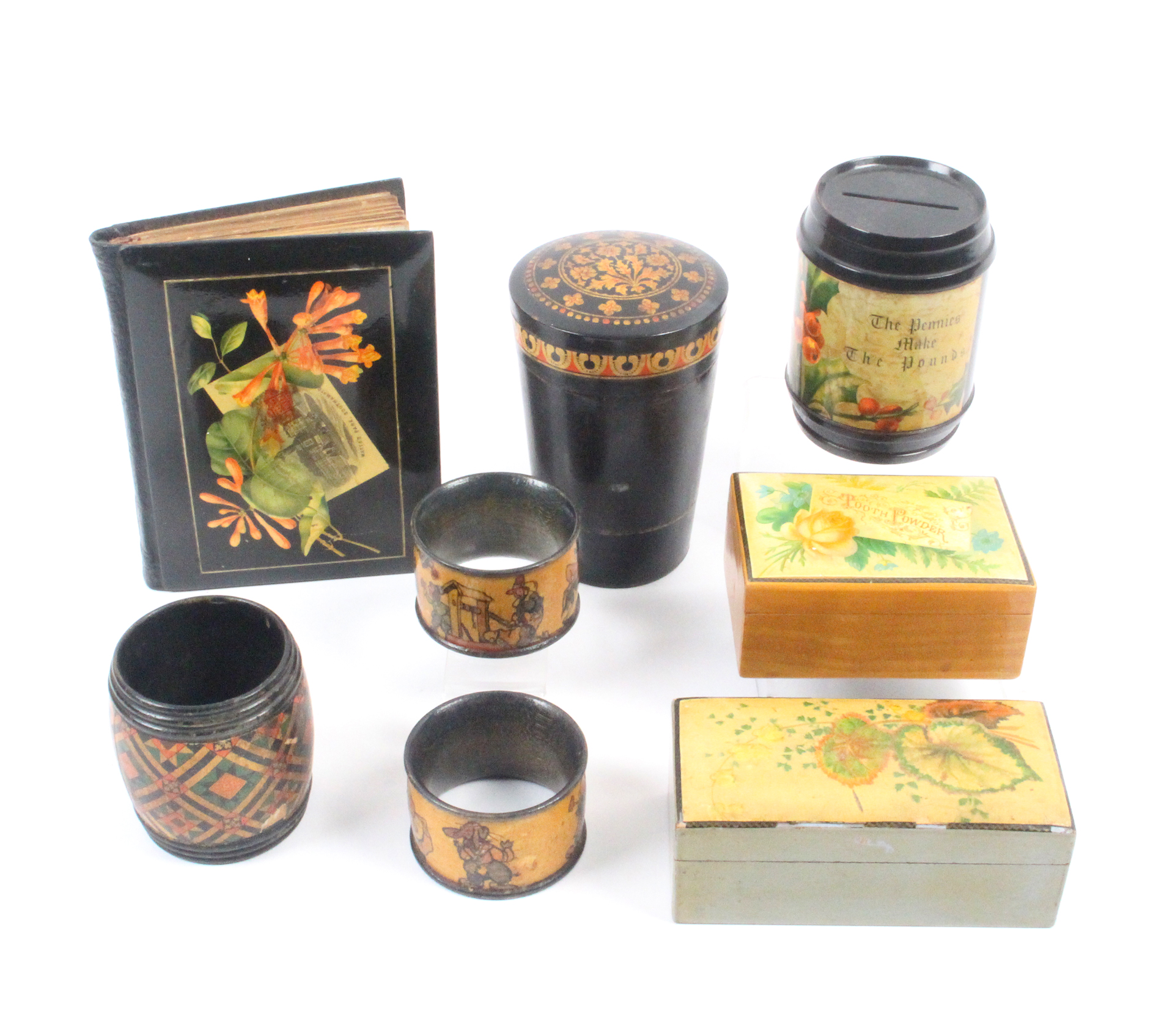 Mauchline ware – eight pieces – alternative finishes comprising a tumbler in tumbler case (black