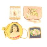 Four scrap work decorated pin and needlebooks, comprising a circular yellow cloth example with