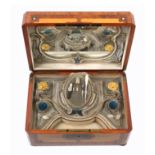An impressive inlaid French musical sewing box, circa 1870, of rectangular form in burr yew, the lid