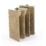 A gilt brass concertina ‘Beatrice’ needle packet case floral covers, stamped ‘Beatrice Patent’, 4.