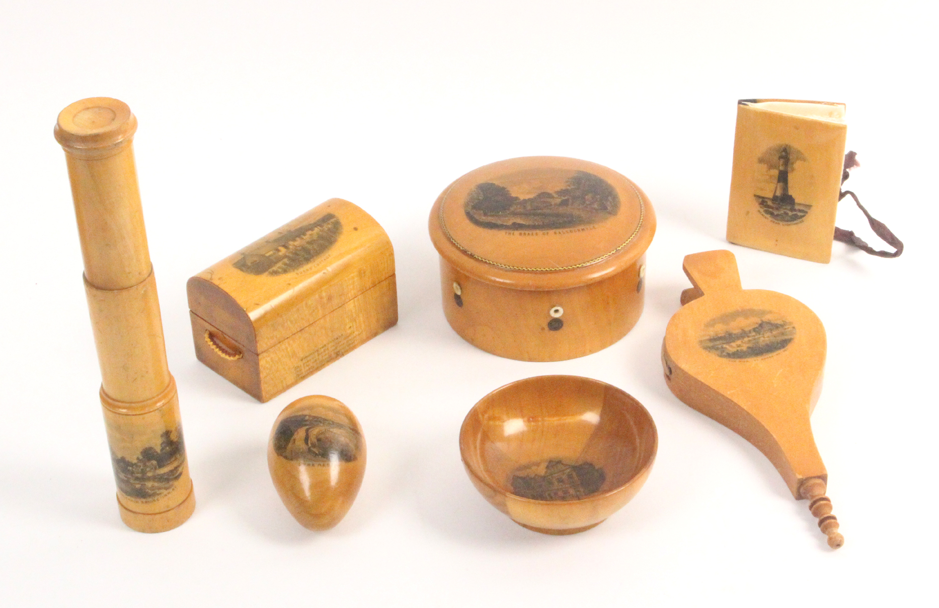 Mauchline ware – sewing – seven pieces comprising a dome top circular reel box (The Braes of