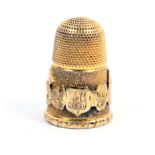 An attractive 19th Century gold thimble, the frosted ground frieze initialled on a shield ‘AG’