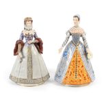 Two Sitzendorf figures “Elizabeth of Austria”, “Catherine de Medici”, dressed in traditional
