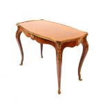A Louis XVI style occasional table, the rectangular top of serpentine outline, the gilt border