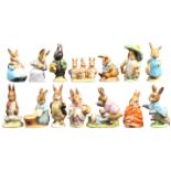 A collection of eighteen Beatrix Potter figures comprising fourteen by Beswick including Mrs