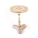 A Paris porcelain occasional table, the circular floral painted top with multiple gilt borders and