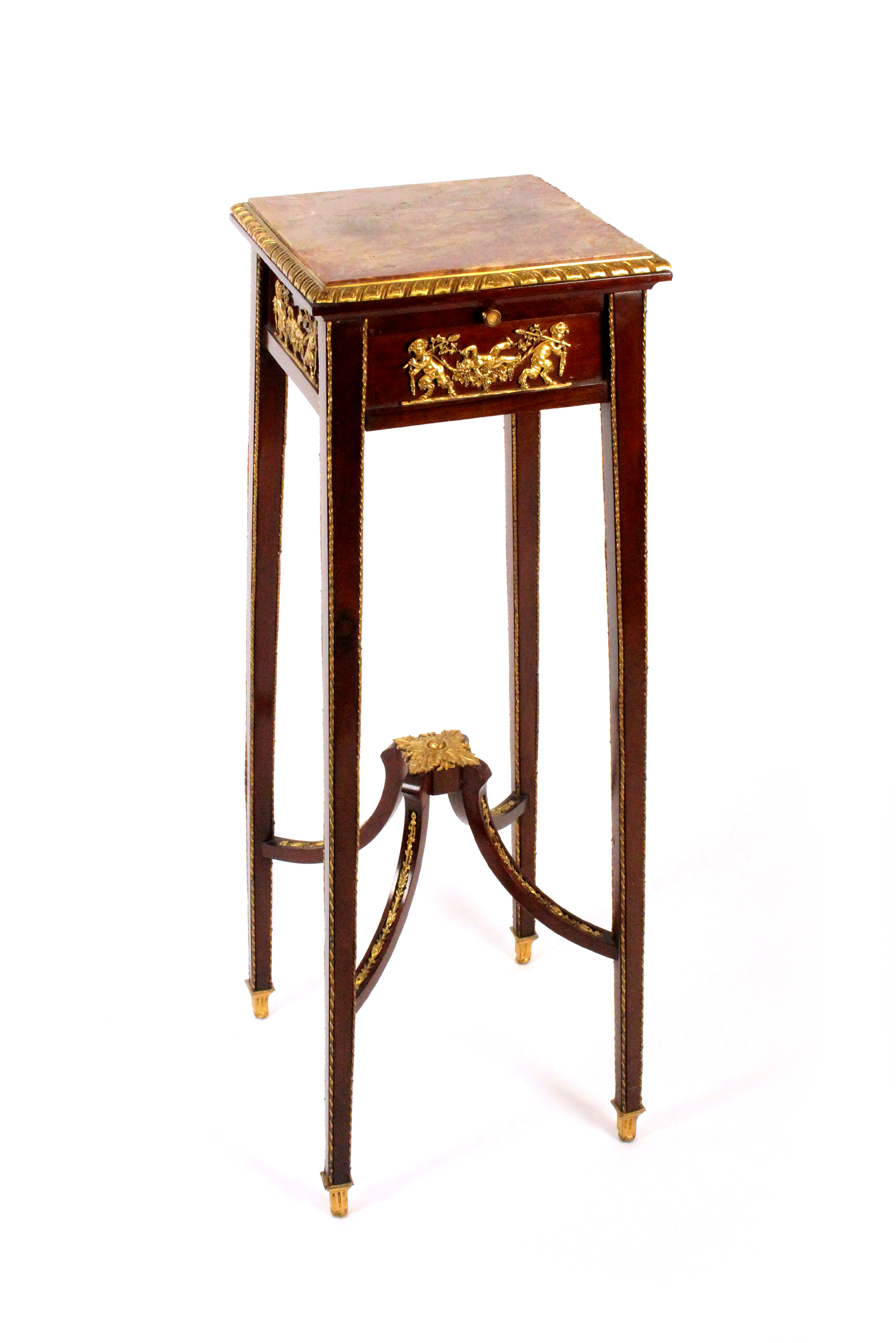 An early 20th century Louis XVI style urn stand, the inset marble top over a gilt metal mounted