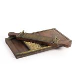 A 19th Century mahogany and brass pill rolling slab with handle, 35.5cm x 19.5cm