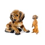 A Rosenthal model of a Daschund puppy, 16cm high, and a smaller model (2)