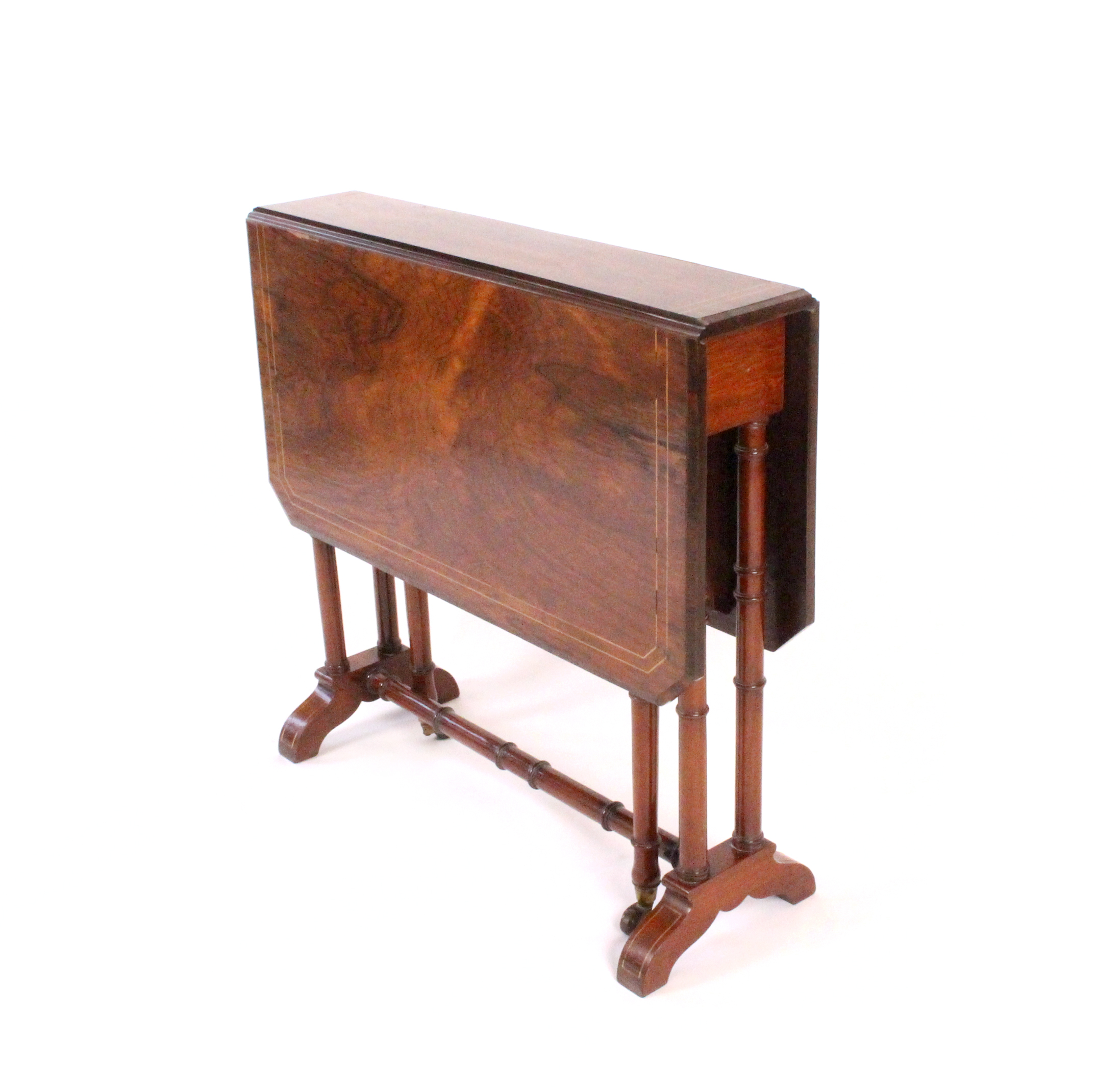 A Victorian rosewood small Sutherland table, on baluster turned end supports united by a turned