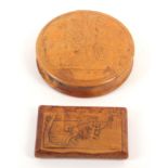 Two 19th Century French pressed burr snuff boxes comprising a circular example titled ‘Descente De