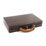 A crocodile skin rectangular jewellery case, “Asprey, London”, initialled ‘AMM’, Bramah lock with