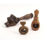 Three 19th Century wooden nutcrackers Swiss/Tyroloean, comprising a screw action continental example