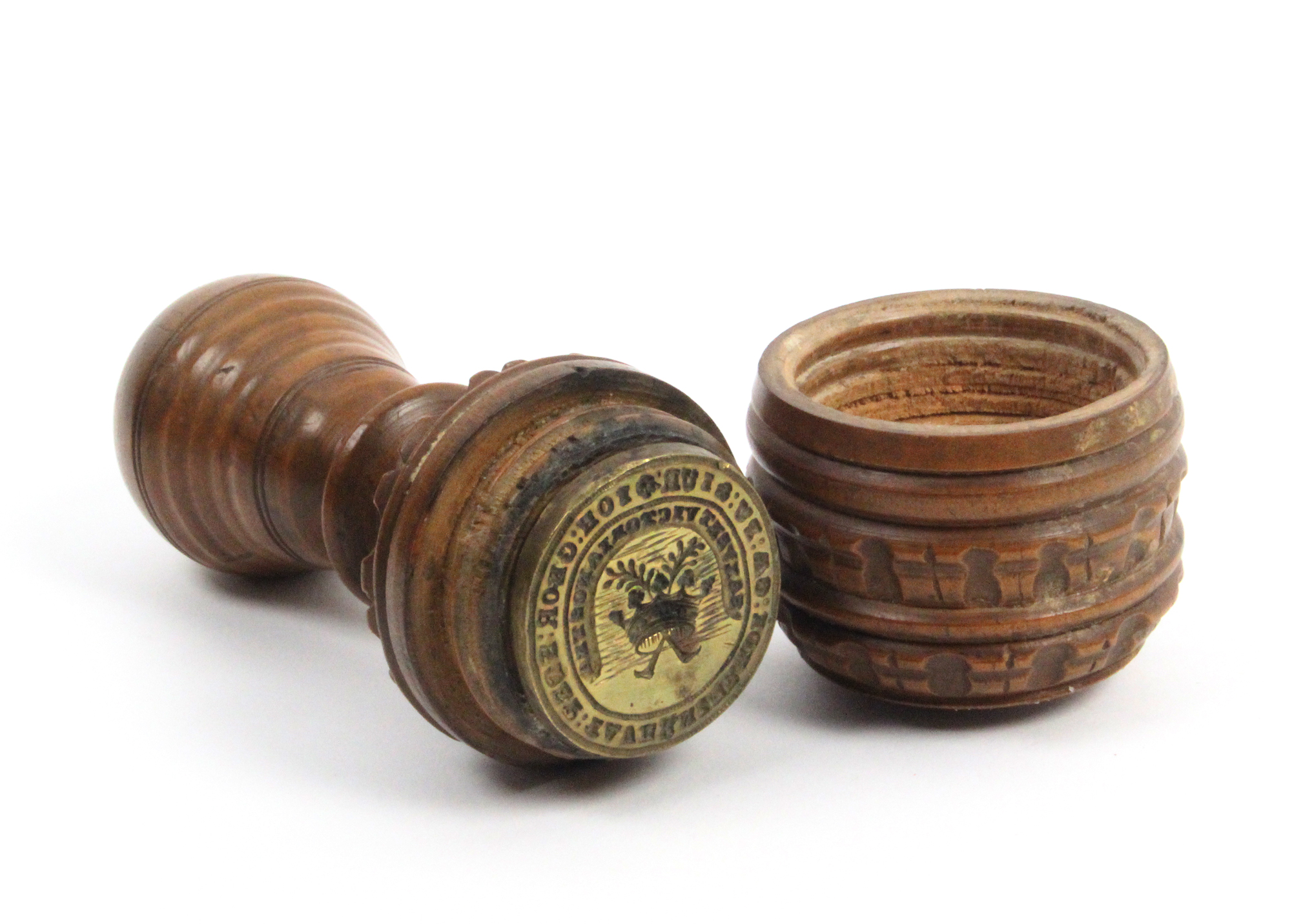 An unusual 19th Century seal contained in a turned and carved gavel form case with printed label ‘