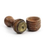 An unusual 19th Century seal contained in a turned and carved gavel form case with printed label ‘