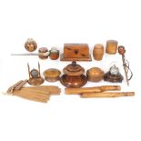 A collection of treen comprising an inlaid money box, 20.5cm, two watch stands one with glass dome