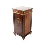 An early 20th century mahogany bedside cabinet, in the Louis XVI style, fitted with a single