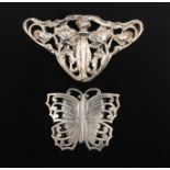 Two silver buckles comprising a lady’s two-piece buckle pierced and engraved as a butterfly,