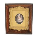 A painted porcelain oval plaque depicting Mary Queen of Scots, 7.5cm, in a gilt mount and frame,