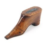 A large early 19th Century mahogany table shoe snuff box, decorated in brass pins, the toe with a