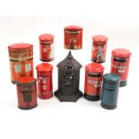 Nine tin money boxes modelled as Post Office Letter Boxes, George V and later, largest 13.5cm and
