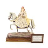 A Royal Worcester limited edition model of Queen Elizabeth I, wearing full regalia and mounted on