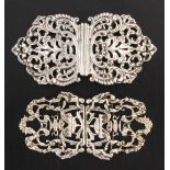 Two silver buckles a lady’s two part example each pierced and cast with leaves, jardinere, canopy