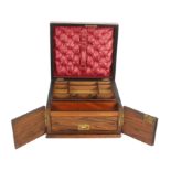 A Victorian walnut lady’s dressing box, brass lid cartouche the buttoned silk lid interior over a