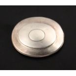 A silver oval pocket snuff box, the hinged lid engraved ‘M. Baxter’ over a vacant oval centre