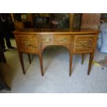 A Georgian design mahogany bow fronted Sideboard with crossbanded border fitted with a centre drawer