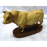 A Beswick model of a Charolais bull on a wooden plinth No. A2463A from the Connoisseur Cattle