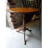 A 19th Century burr wood circular Occasional Table on a vase turned column and triple splay