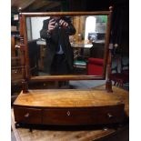 A 19th Century mahogany oblong swing Toilet Mirror in mahogany frame and on three drawer stand