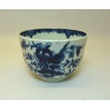 An 18th Century Worcester first period circular Bowl decorated with flowers in blue and white and