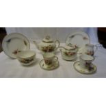 A Victorian Royal Worcester early morning Tea Set decorated with sprays of spring flowers within a