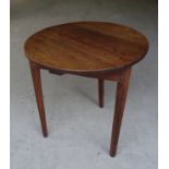 An early 19th Century oak and elm circular Cricket Table. 2' 2" (66cms) diameter.