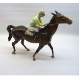 A Beswick Model of a racehorse and jockey, No. 1037, second version, with the number 24 on the