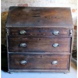 A 19th Century oak Bureau with hinged fall, three drawers under. 3' 3" (99cms) wide.