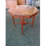 An Edwardian mahogany octagonal two tier Occasional Table inlaid with satinwood banding on square