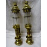 A pair of brass Carriage Candle Lamps inscribed 'G.W.R.' 13 1/2" (34cms) high.