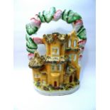 A Victorian Staffordshire pottery flat back Mantel Ornament in the form of a castle entrance. 9" (