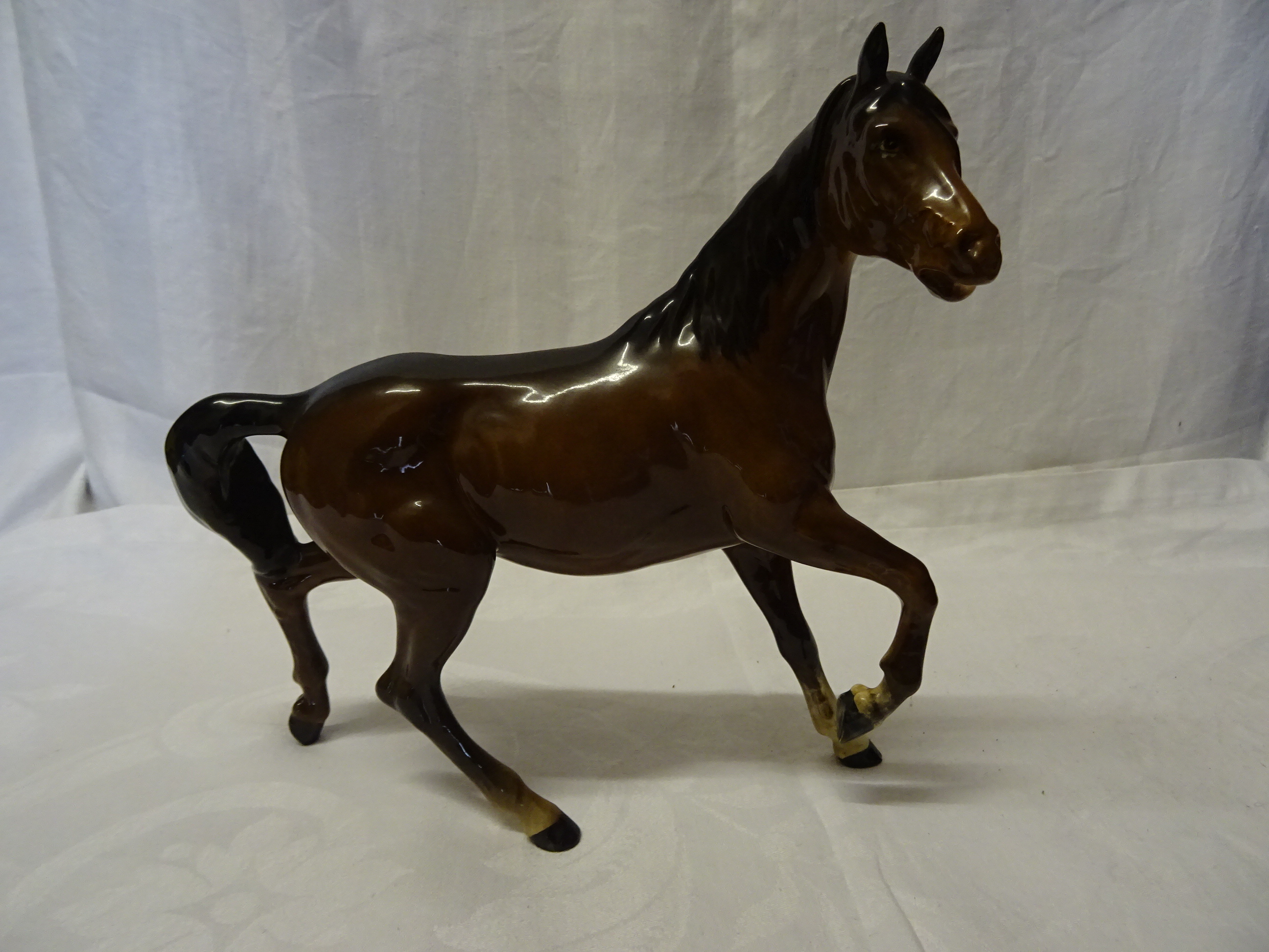 A Beswick Model "Spirit of the wind" in brown gloss, No. 2688 and a Royal Doulton model of "Desert - Image 2 of 3