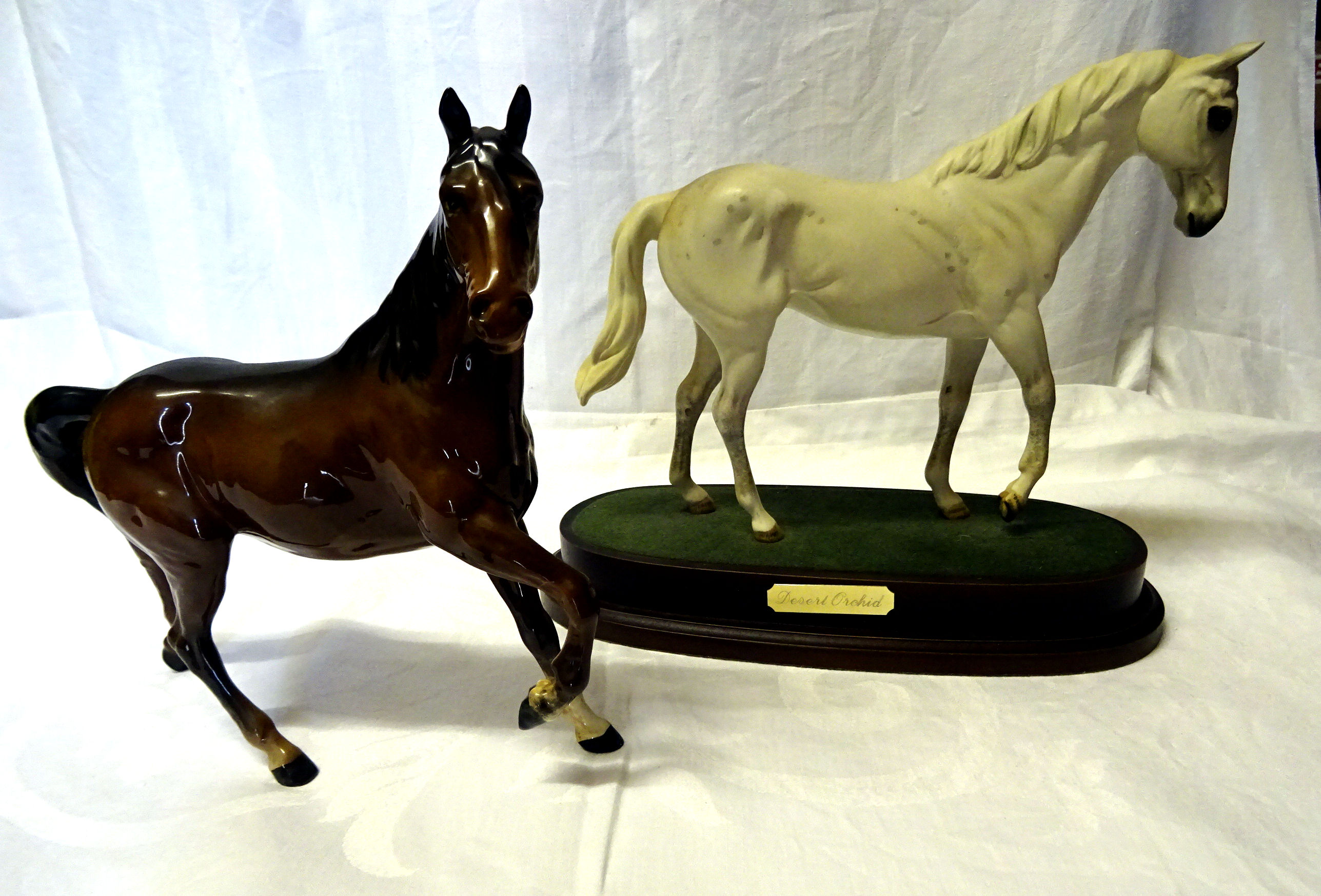 A Beswick Model "Spirit of the wind" in brown gloss, No. 2688 and a Royal Doulton model of "Desert