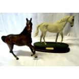 A Beswick Model "Spirit of the wind" in brown gloss, No. 2688 and a Royal Doulton model of "Desert