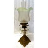 A table Oil Lamp with frosted glass shade and clear glass reservoir on a metal base.