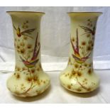 A pair of Crown Ducal Vases decorated with birds and flowers on a blush ivory ground. 9" (23cms)