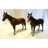 A Beswick Model of the racehorse "Bois Roussel", second version in brown gloss No. 701 and another