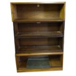 An oak four tier sectional Bookcase with glazed sliding door. 3' (92cms) wide.