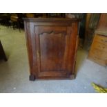 An early 19th Century oak corner Wall Cupboard enclosed by single fielded panel door. 3' 3" (