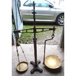 A set of Victorian brass and cast iron Beam Scales by Bartlett, Bristol. 2' 8" (82cms) high.